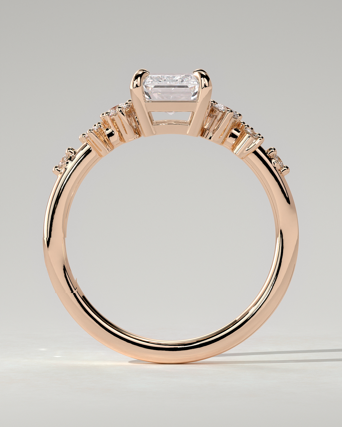 Nellie Solitaire Emerald Ring
