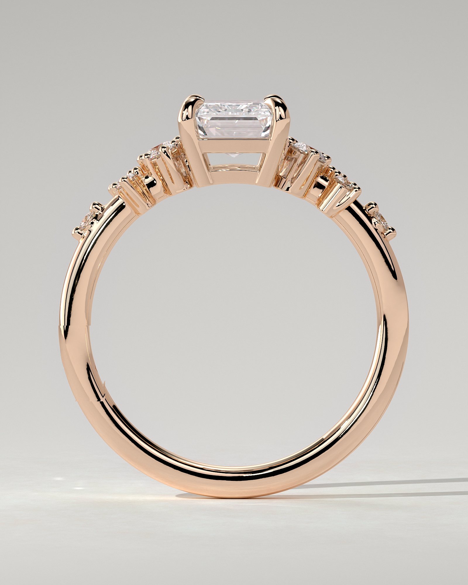 Nellie Solitaire Emerald Ring