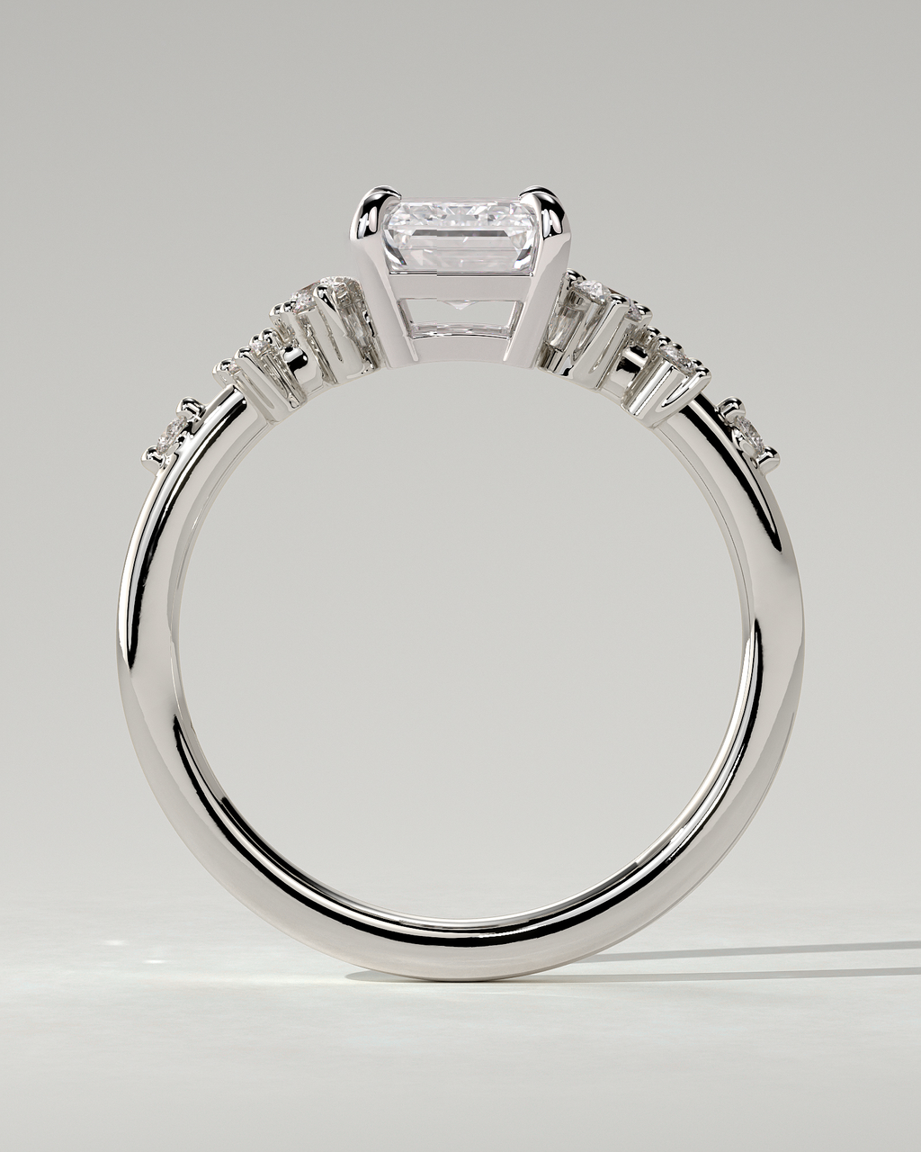 Nellie Solitaire Emerald Ring