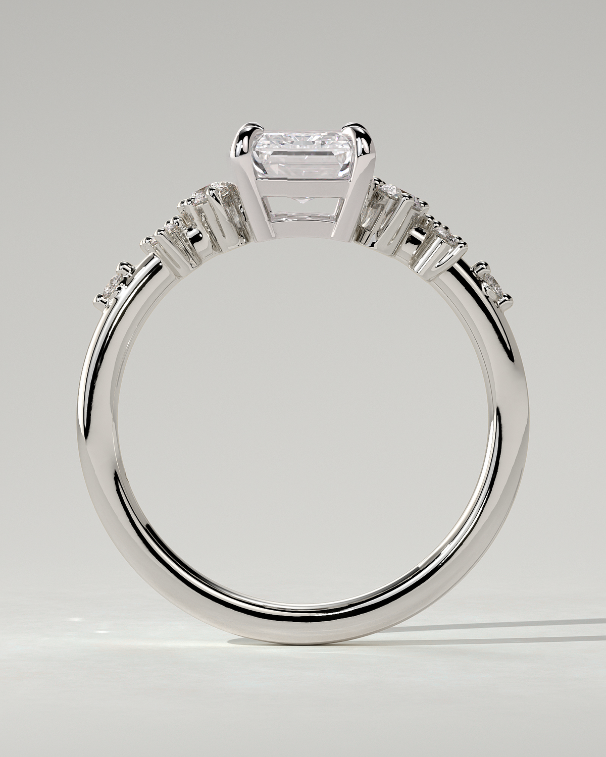 Nellie Solitaire Emerald Ring