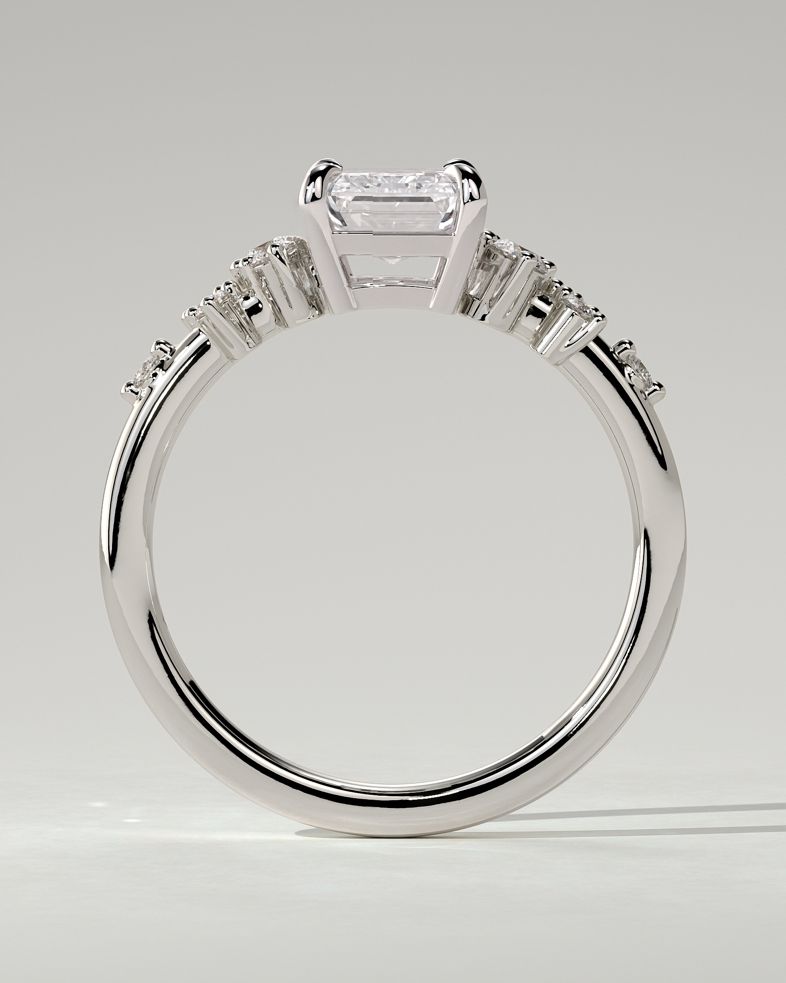 Nellie Solitaire Emerald Ring