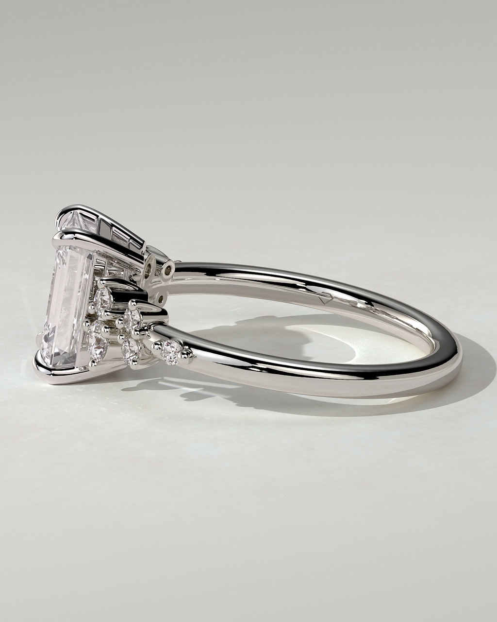 Nellie Solitaire Emerald Ring