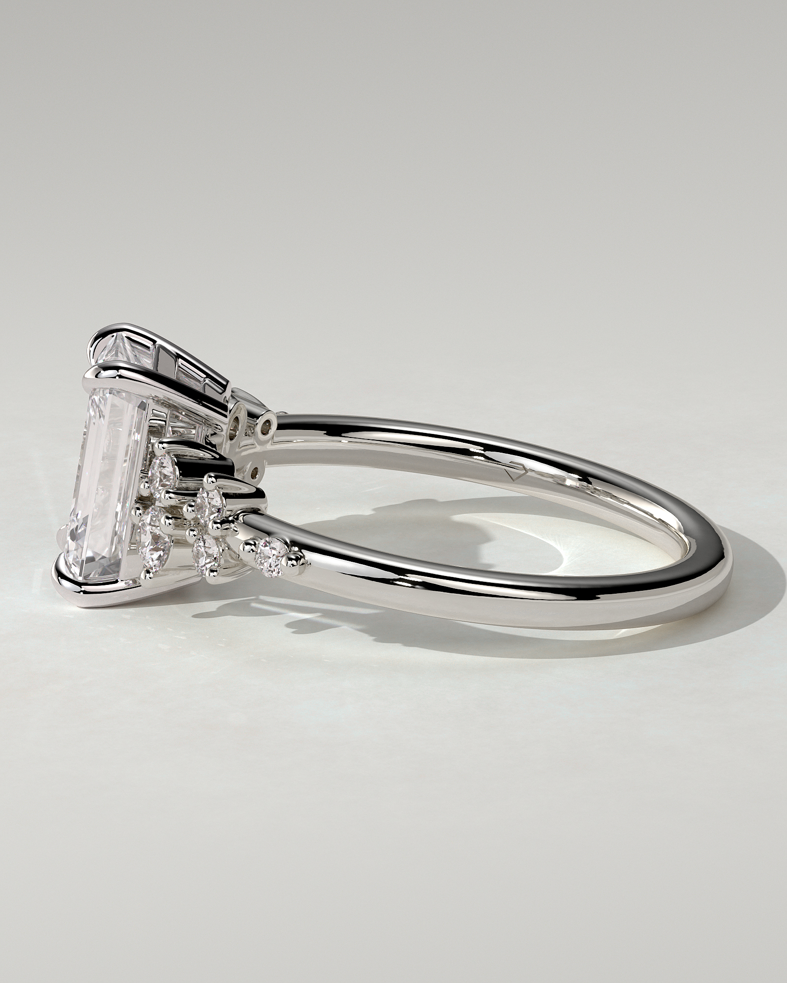 Nellie Solitaire Emerald Ring
