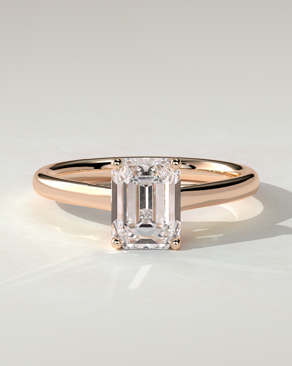 Nora Solitaire Emerald Ring