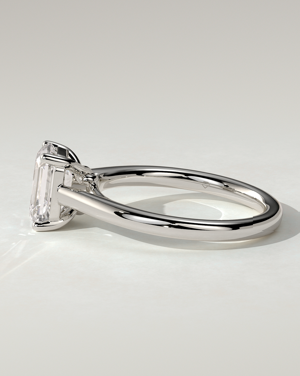 Nora Solitaire Emerald Ring