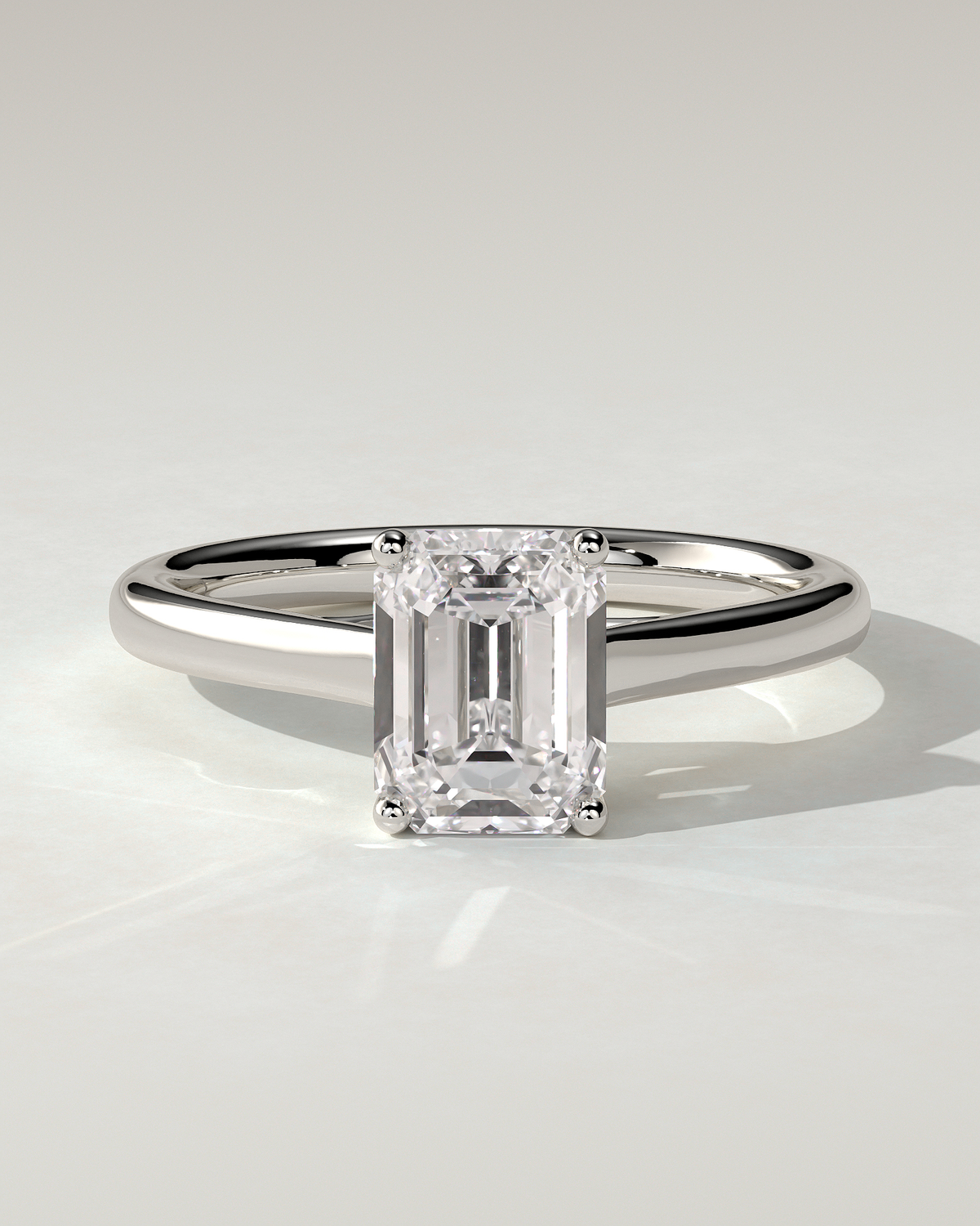 Nora Solitaire Emerald Ring