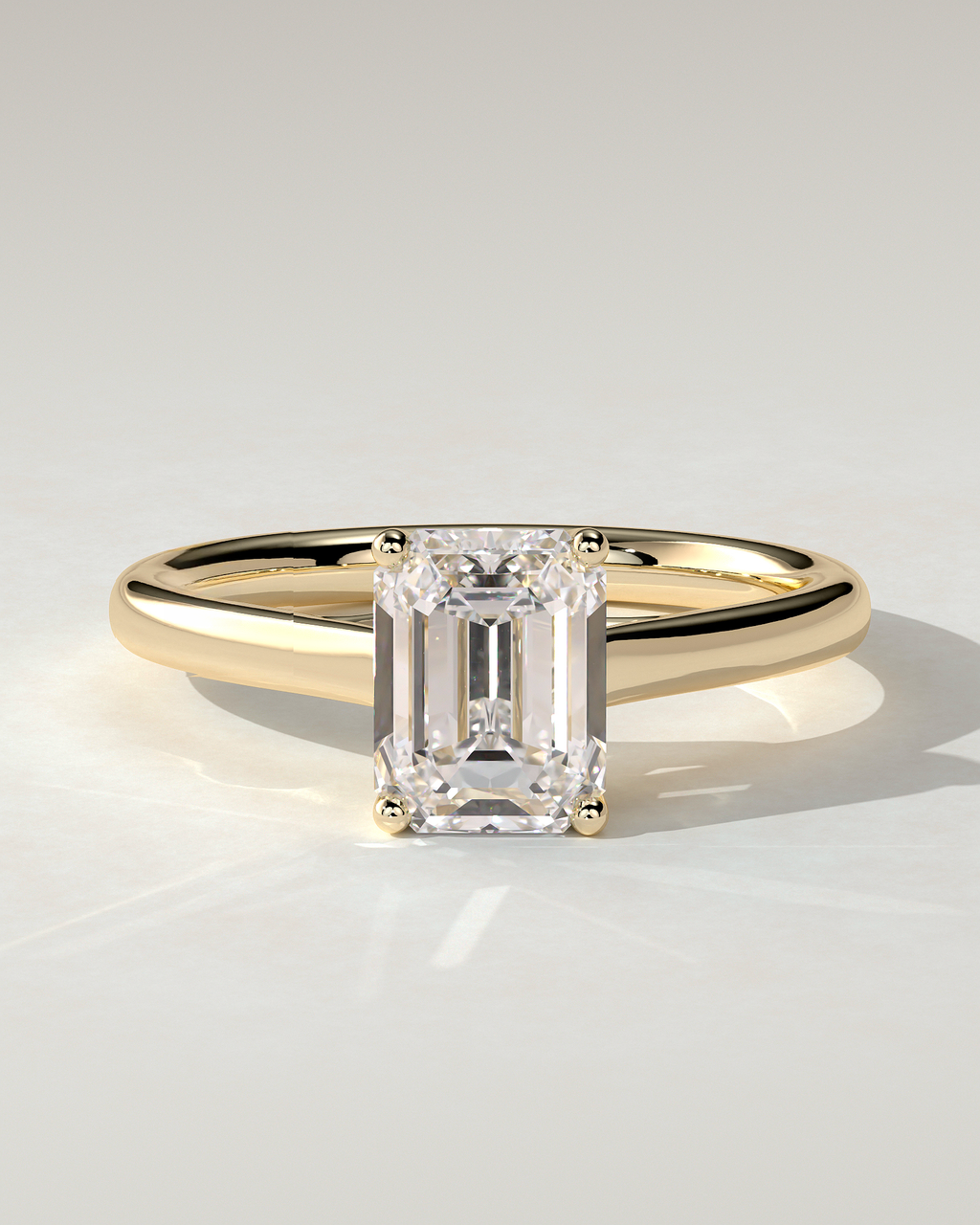 Nora Solitaire Emerald Ring