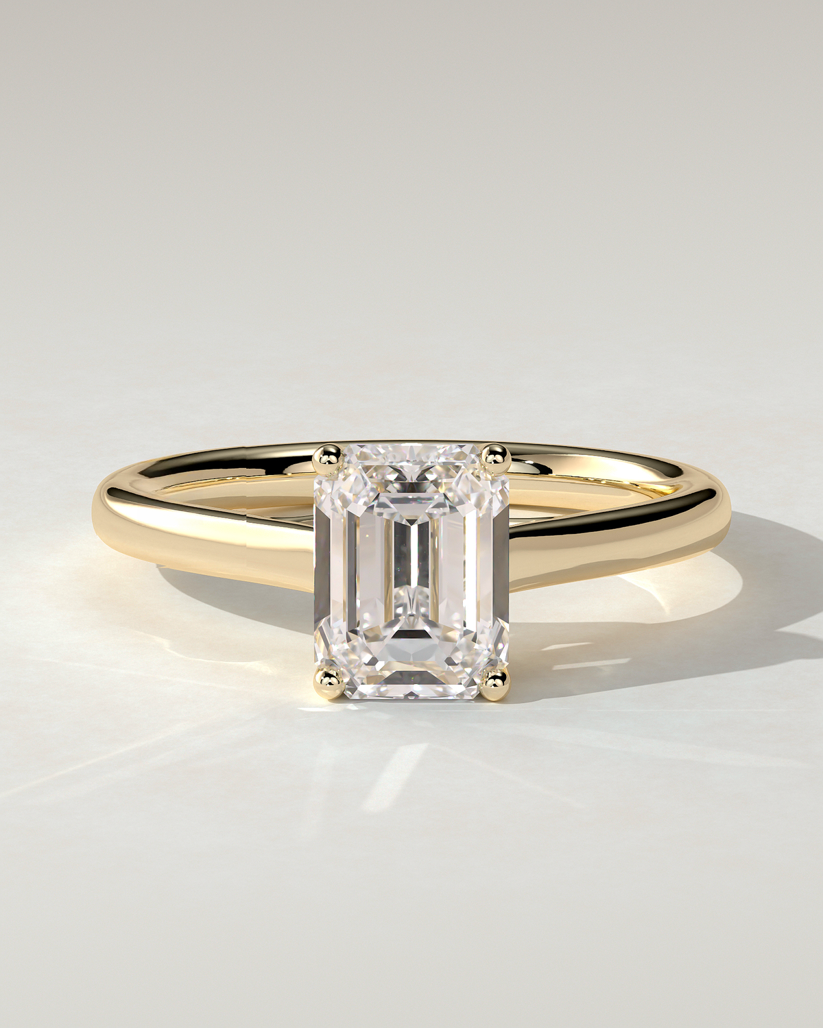 Nora Solitaire Emerald Ring