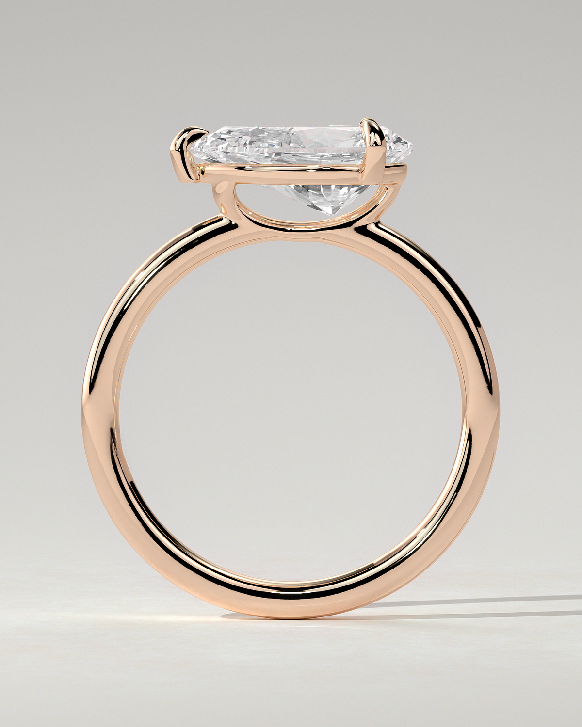 Suki Solitaire Pear Ring