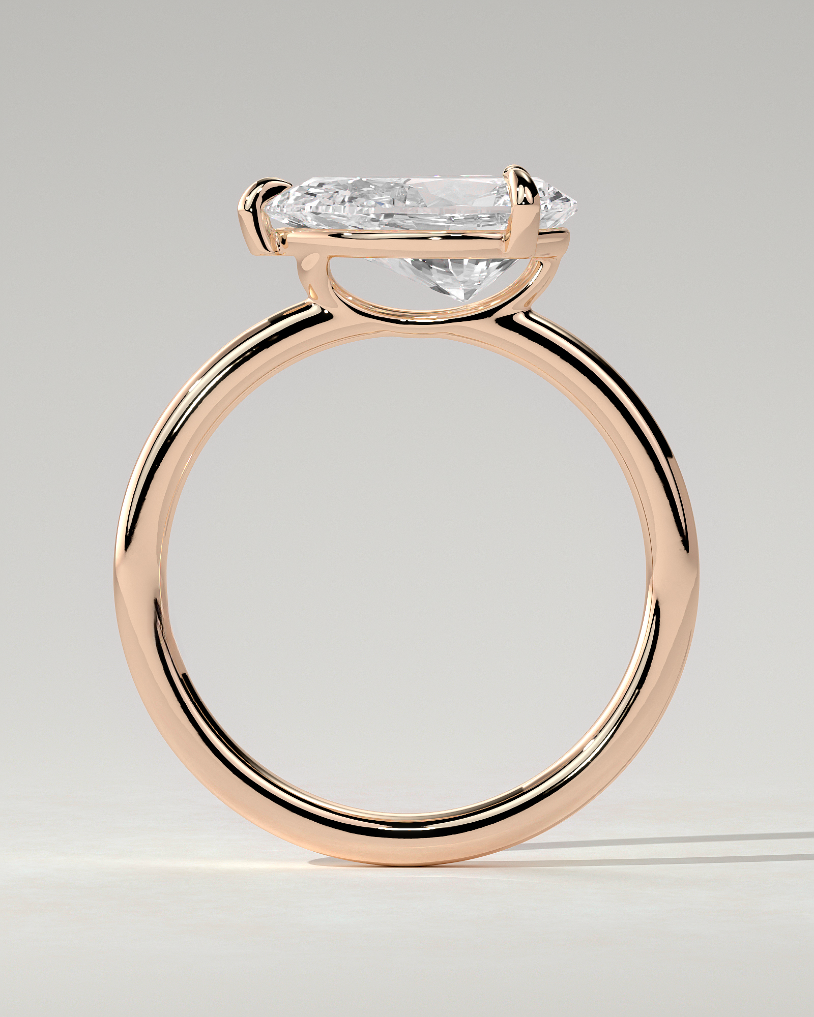 Suki Solitaire Pear Ring