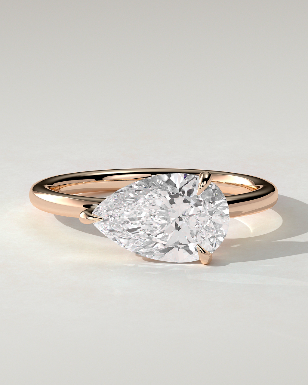 Suki Solitaire Pear Ring