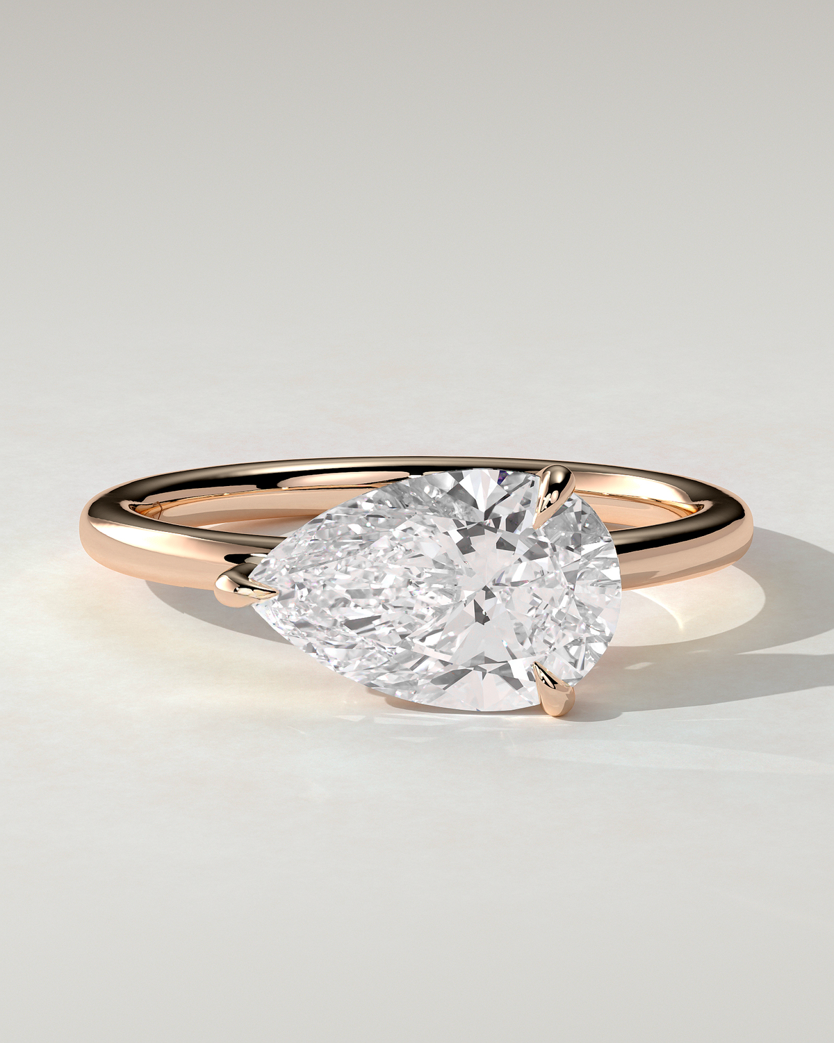 Suki Solitaire Pear Ring