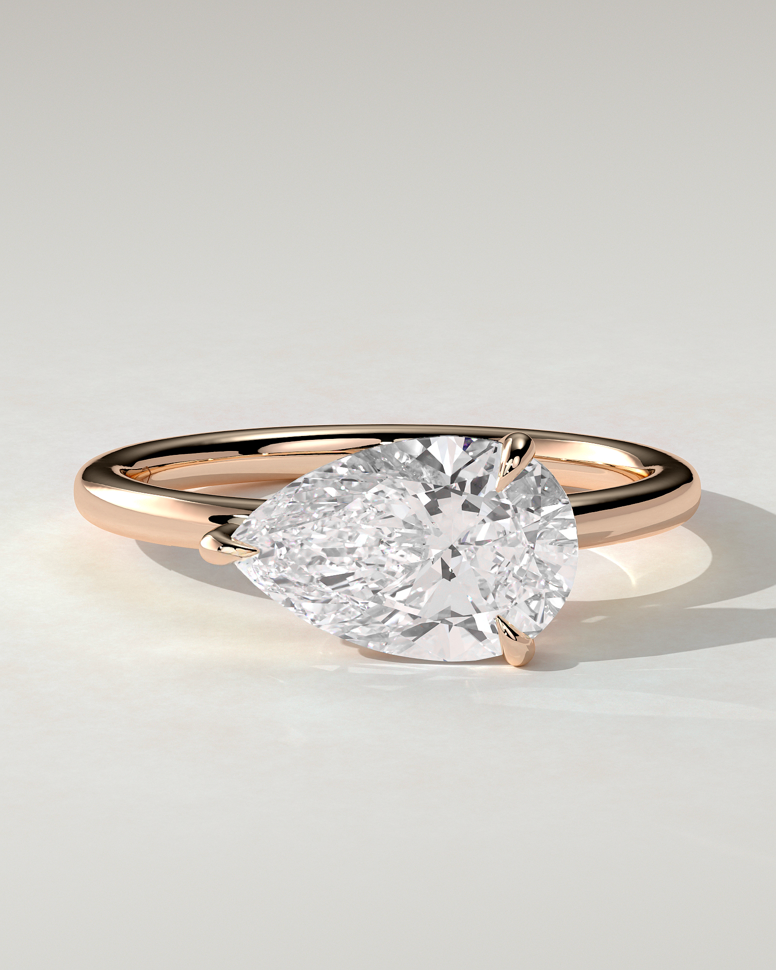 Suki Solitaire Pear Ring