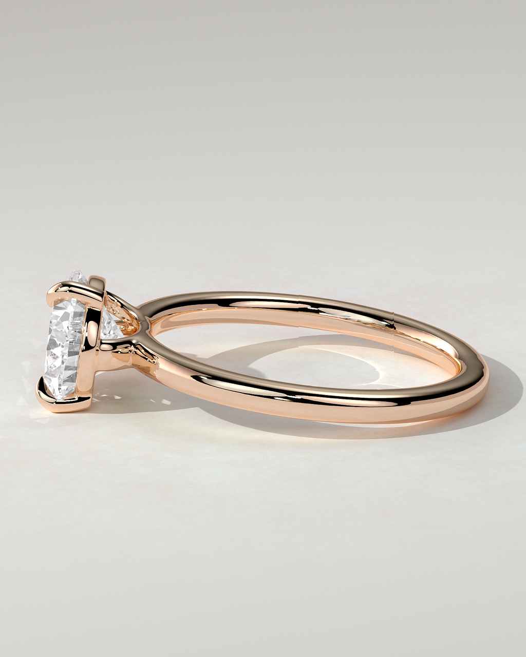 Suki Solitaire Pear Ring