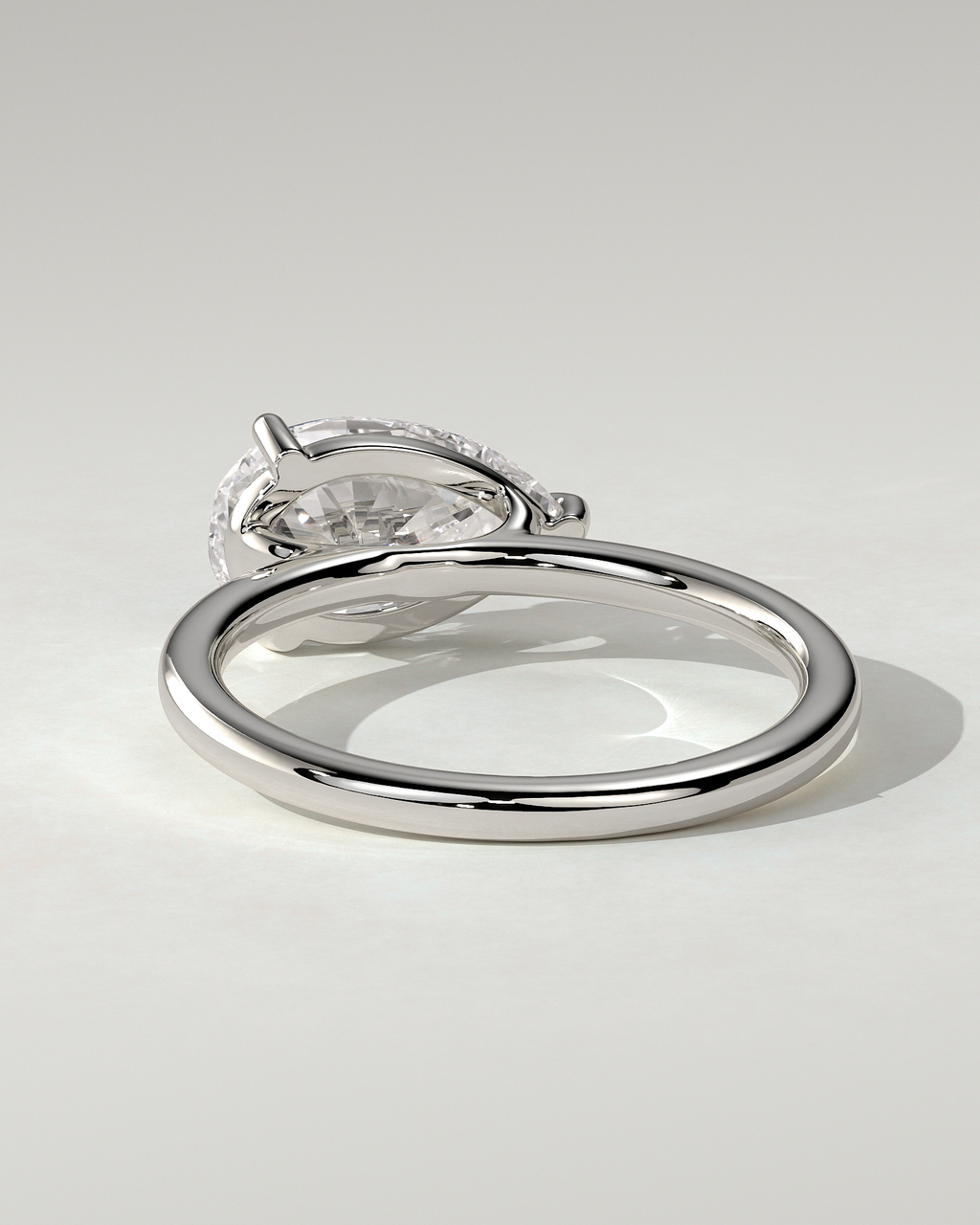 Suki Solitaire Pear Ring