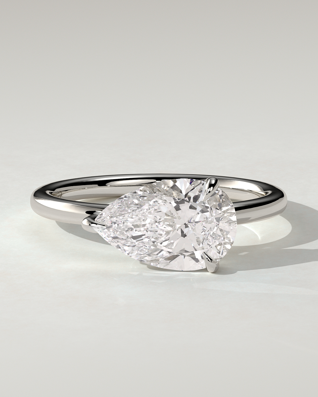 Suki Solitaire Pear Ring