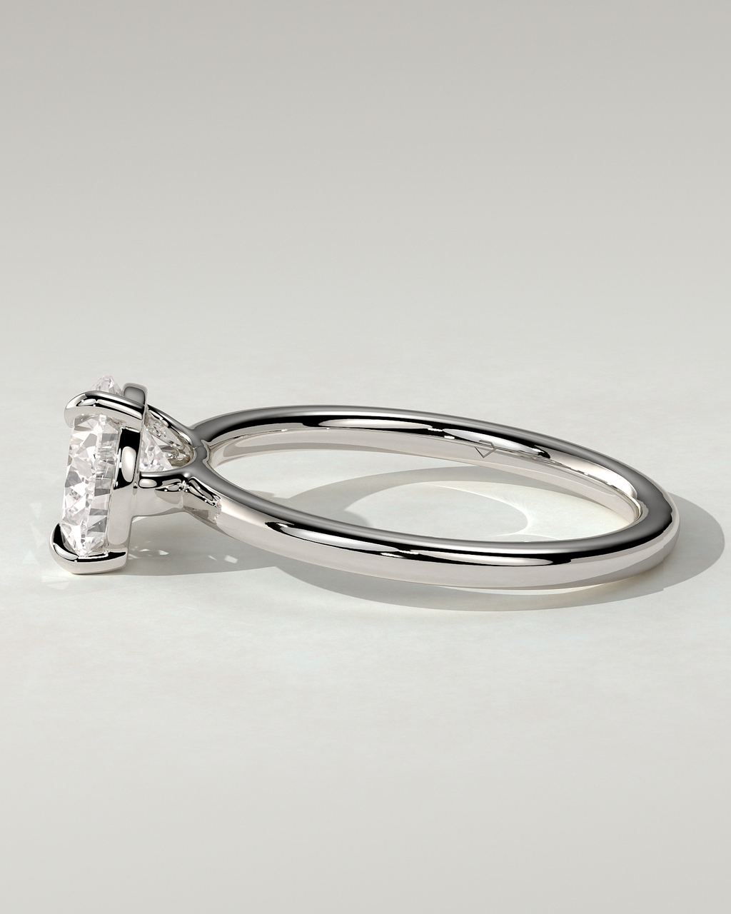Suki Solitaire Pear Ring