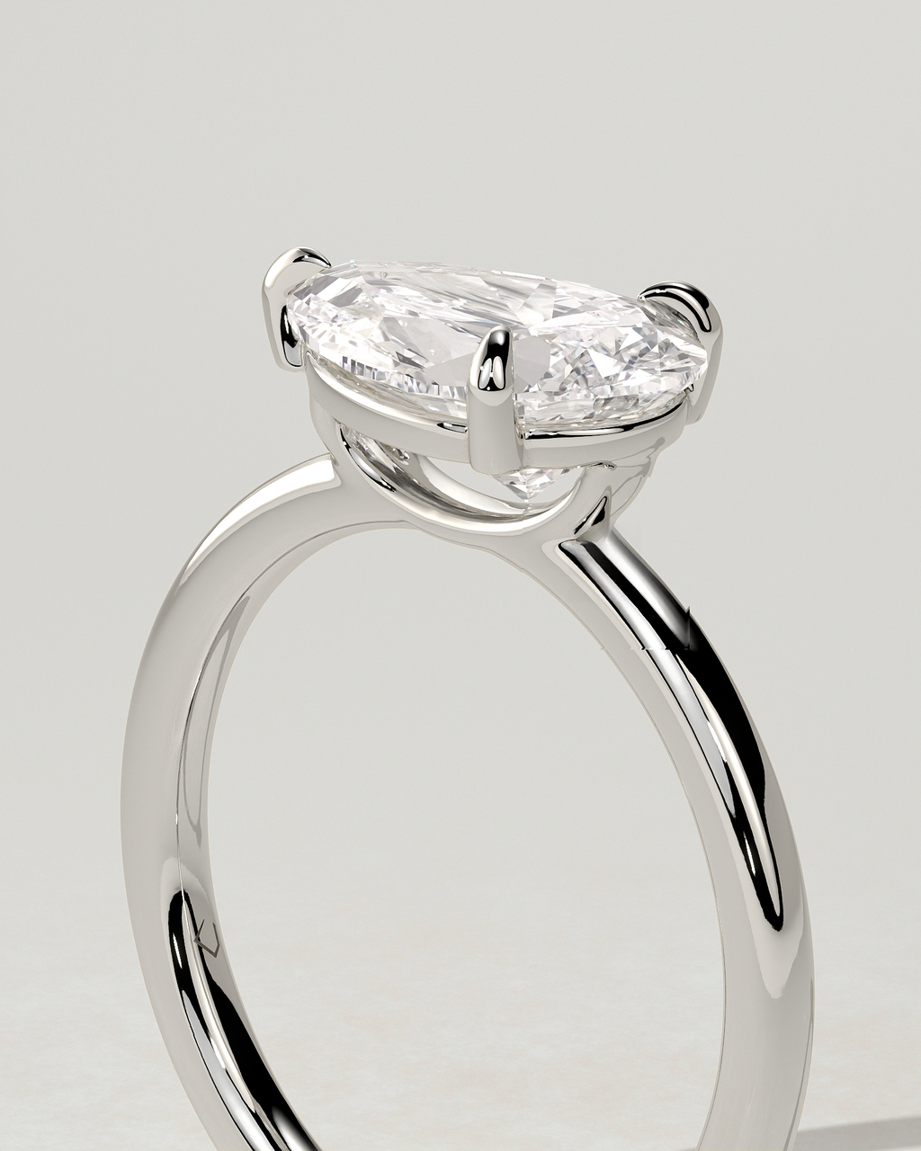 Suki Solitaire Pear Ring