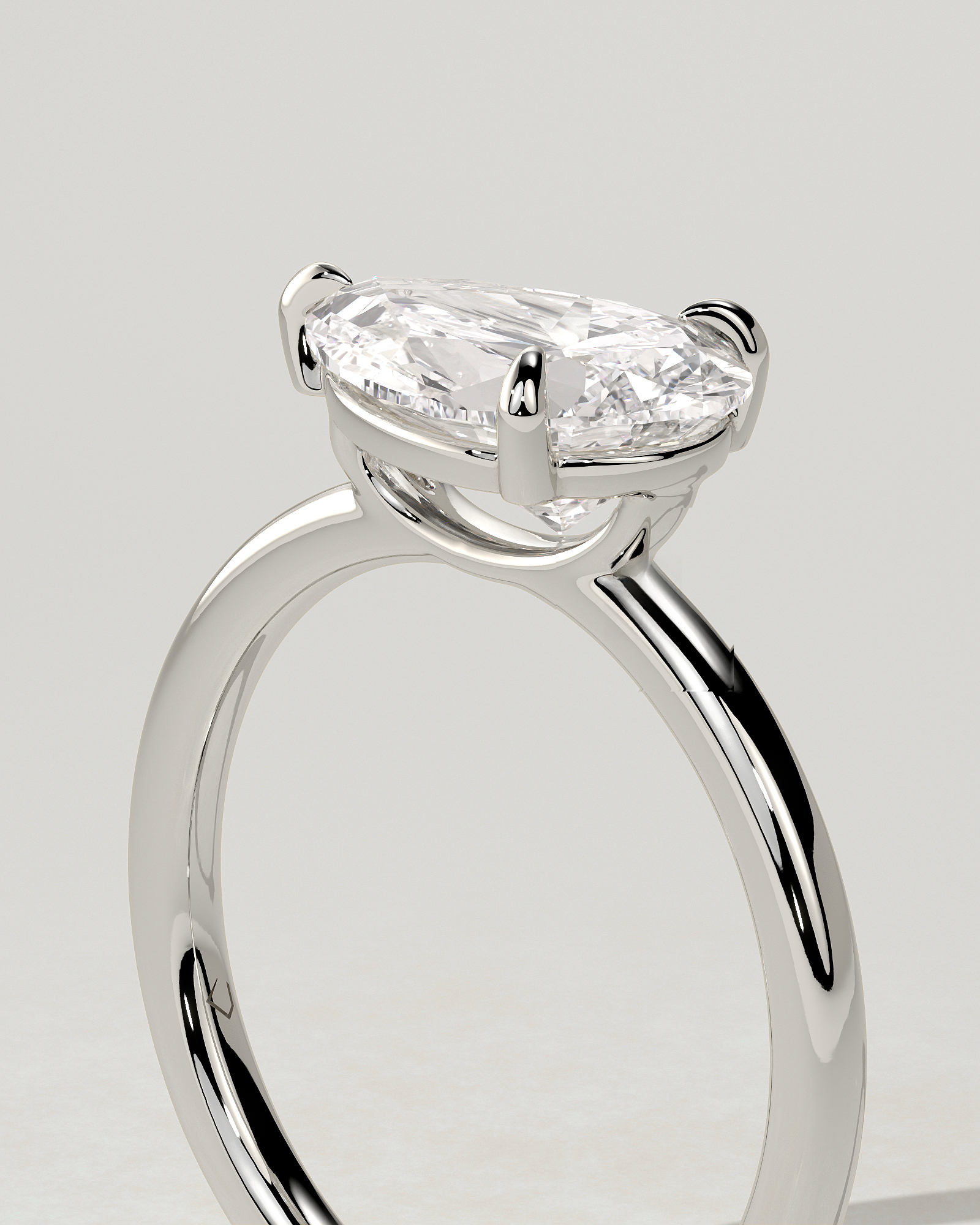 Suki Solitaire Pear Ring