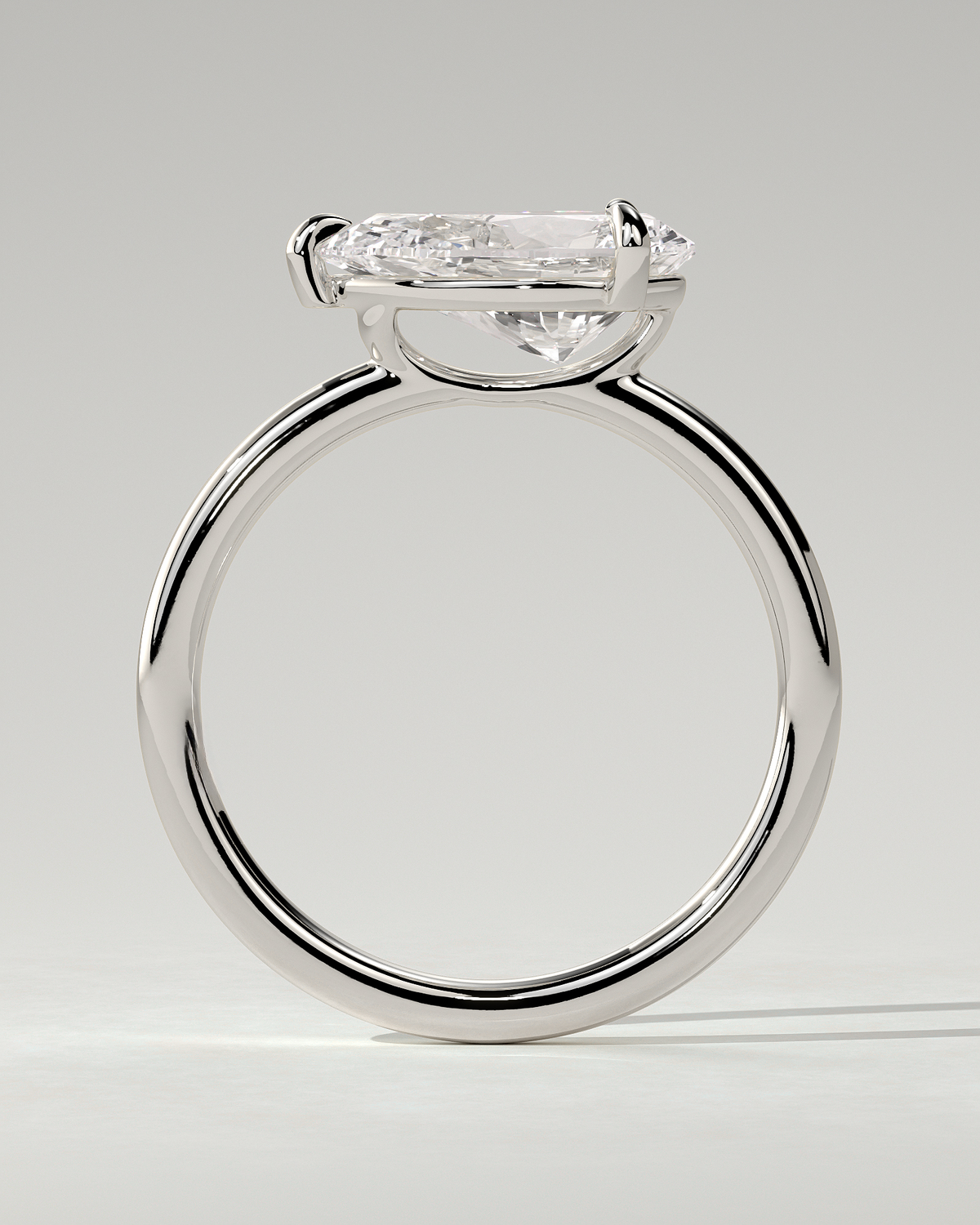 Suki Solitaire Pear Ring