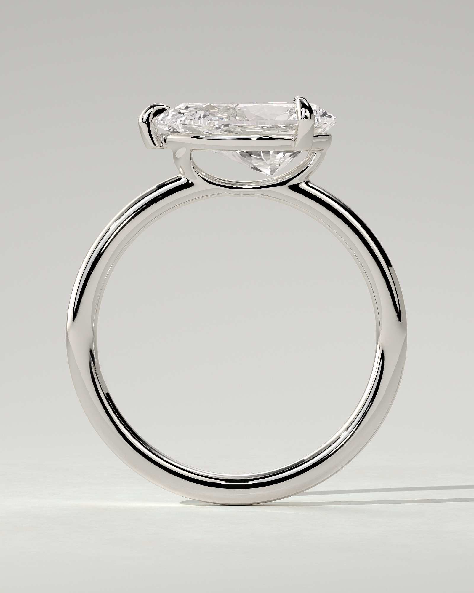 Suki Solitaire Pear Ring