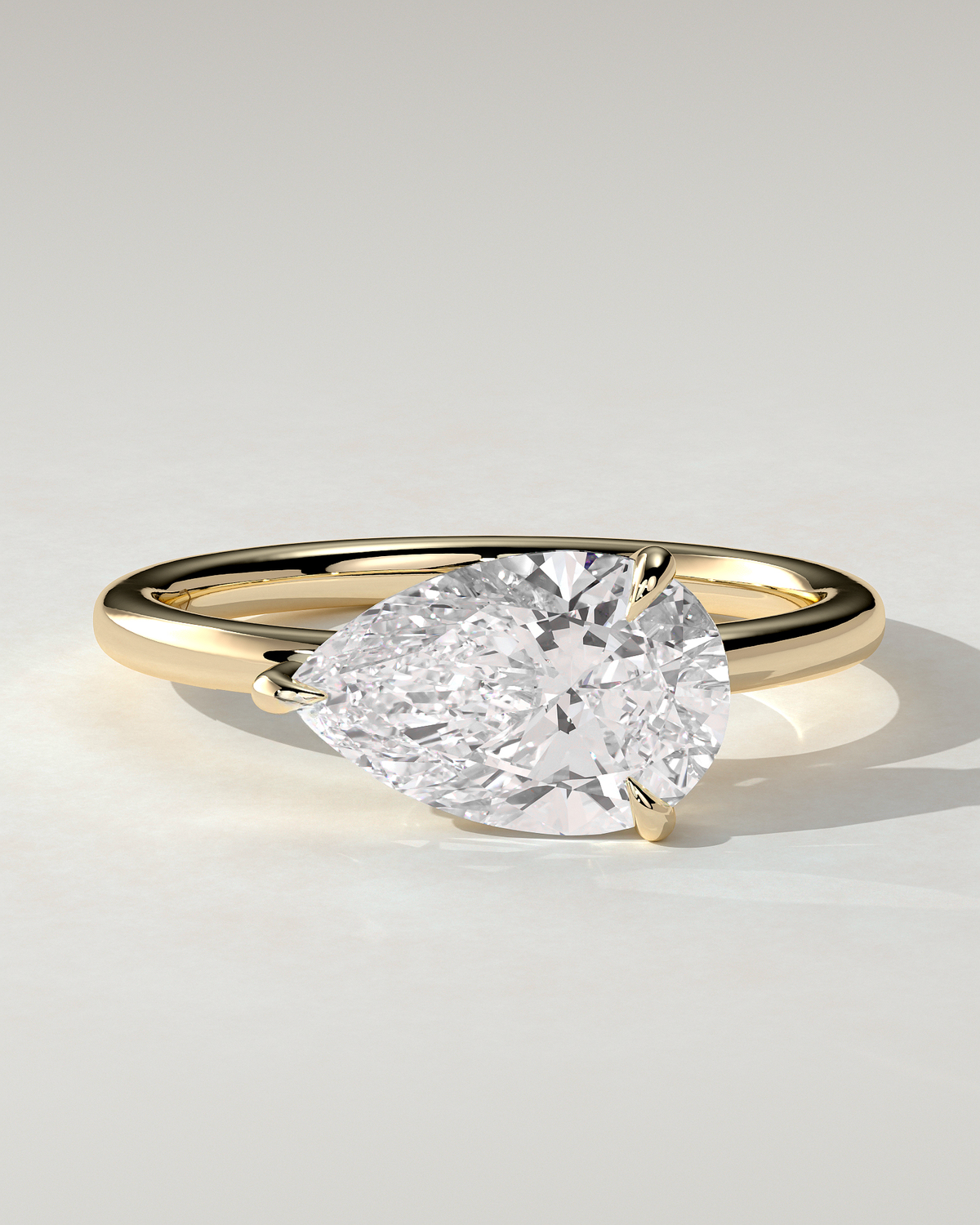 Suki Solitaire Pear Ring
