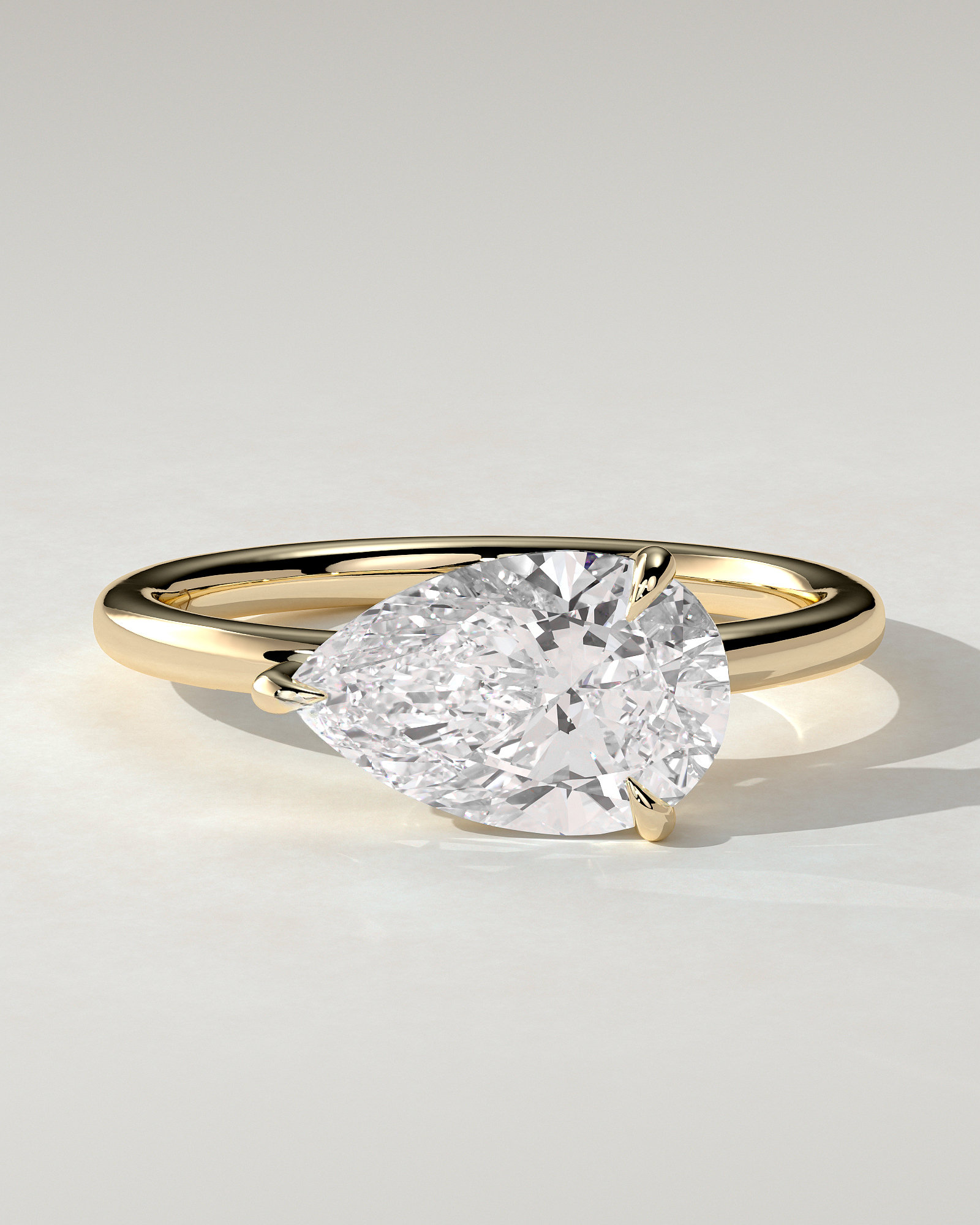 Suki Solitaire Pear Ring