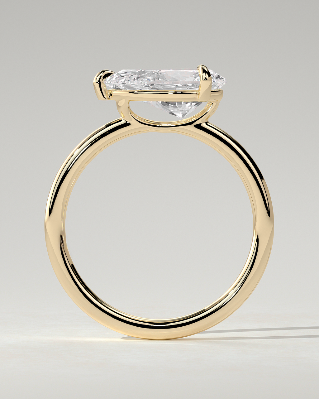 Suki Solitaire Pear Ring