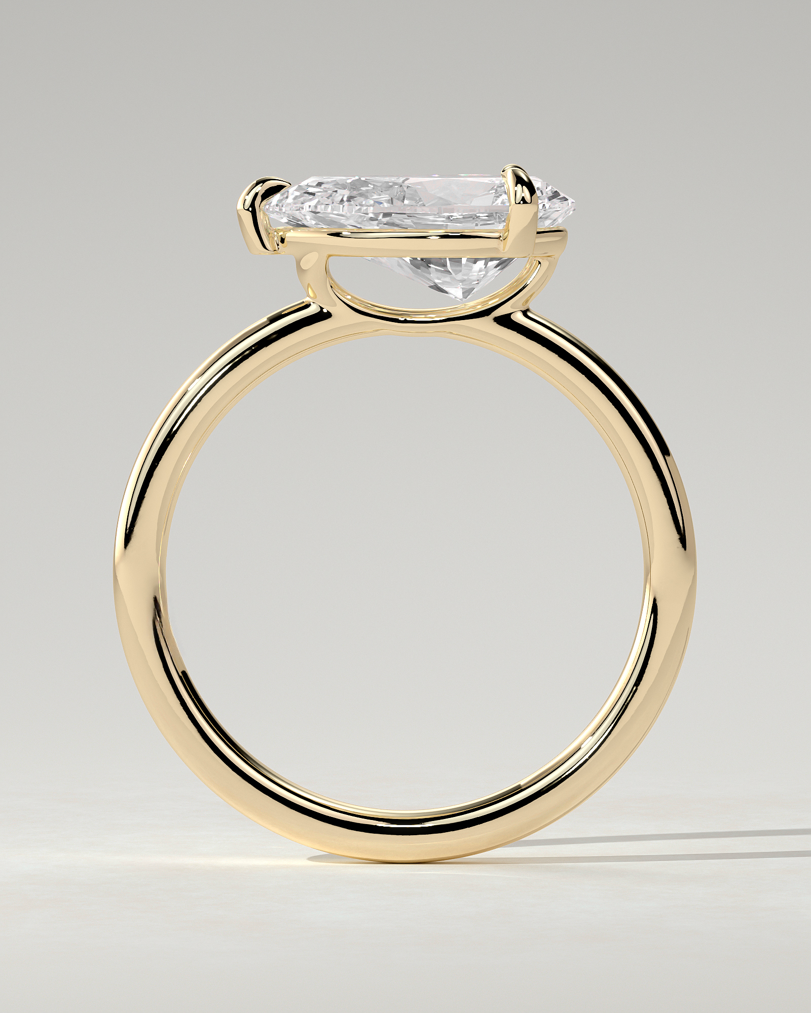 Suki Solitaire Pear Ring